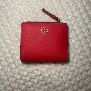 Red Tory Burch wallet slightly worn